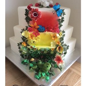 Rainforest inspired wedding cake bright colours red, green,yellow