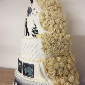6 tier wedding cake half chocolate roses half in monochrome