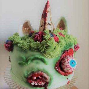 green zombie horror unicorn cake